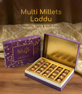 Multi Millets Laddu in the packaging box